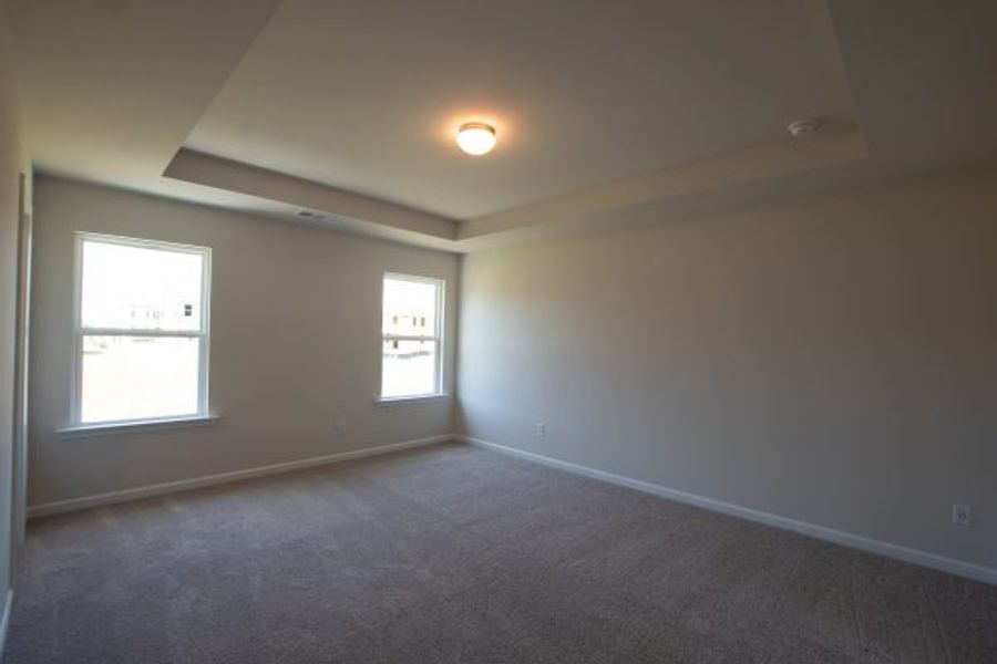 Representative unfurnished interior of a home built from the Fairfax by Piedmont Residential in Falls Creek, Flowery Branch (Image 22).