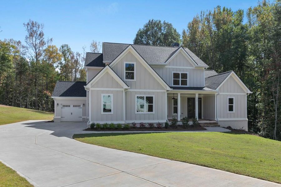 Front exterior of a new home in , Dawsonville, GA, highlighting curb appeal (Image 2).