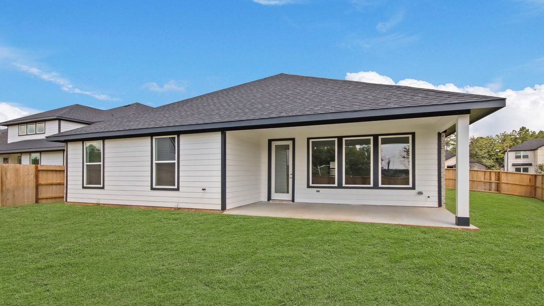 Exterior details and patio area of a home in Hills of Westlake, Conroe (Image 4). Exterior details and patio area of a home in Hills of Westlake, Conroe (Image 4).
