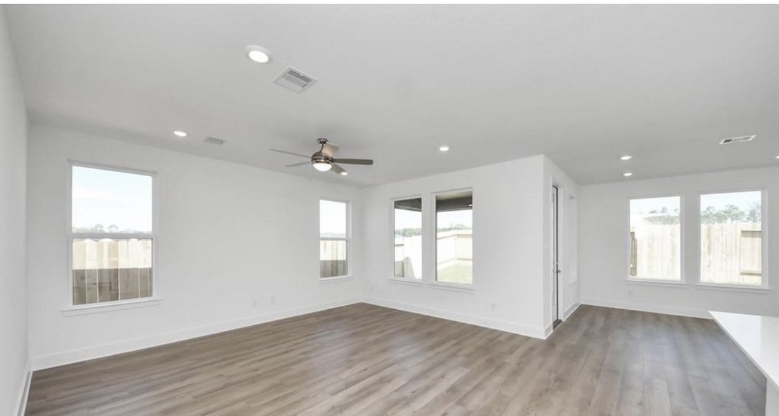 Spacious, unfurnished interior of a new home in The Canopies, Splendora (Image 6).