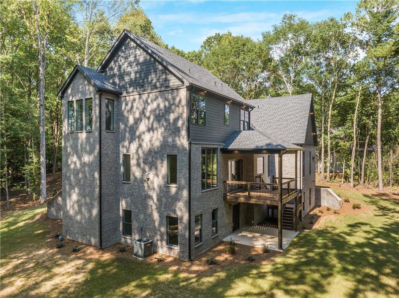 Front exterior of a new home in , Commerce, GA, highlighting curb appeal (Image 26).