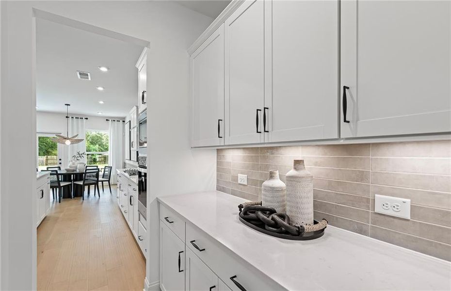Furnished interior view inside a new home in Reunion, Flowery Branch (Image 9).