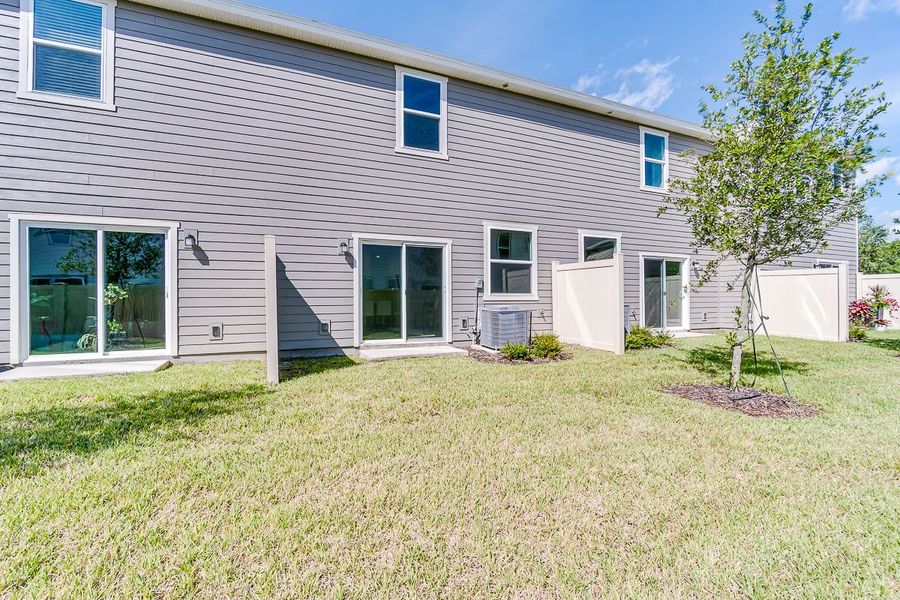Exterior details of a home in Orchard Park Townhomes, St. Augustine (Image 6).