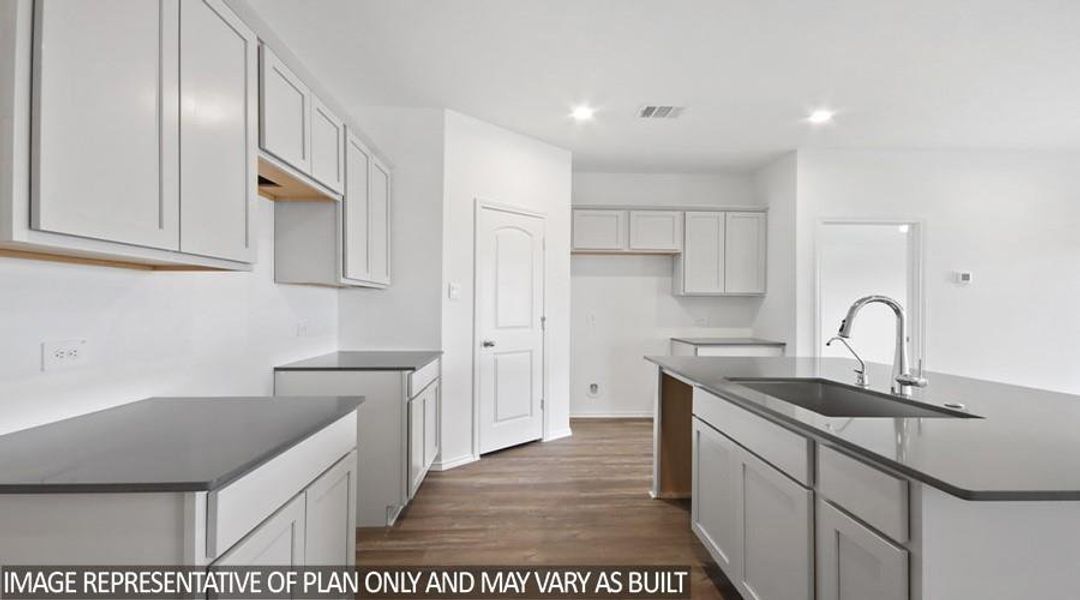 Furnished interior view inside a new home in Sunterra Lakes, Brookshire (Image 4).