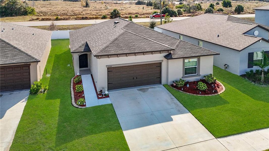 Front exterior of a new home in , Spring Hill, FL, highlighting curb appeal (Image 25).