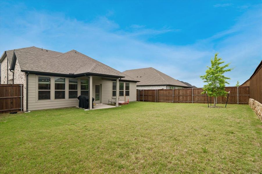 Exterior details and patio area of a home in Devonshire, Forney (Image 3).