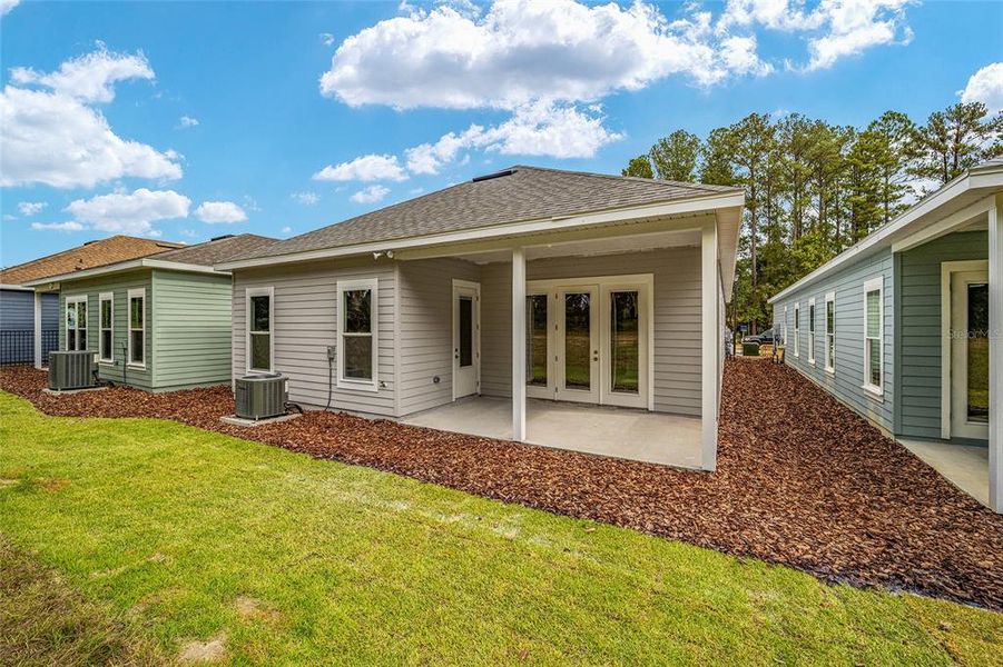 Front exterior of a new home in Fairway Pointe at West End, Newberry, FL, highlighting curb appeal (Image 25).