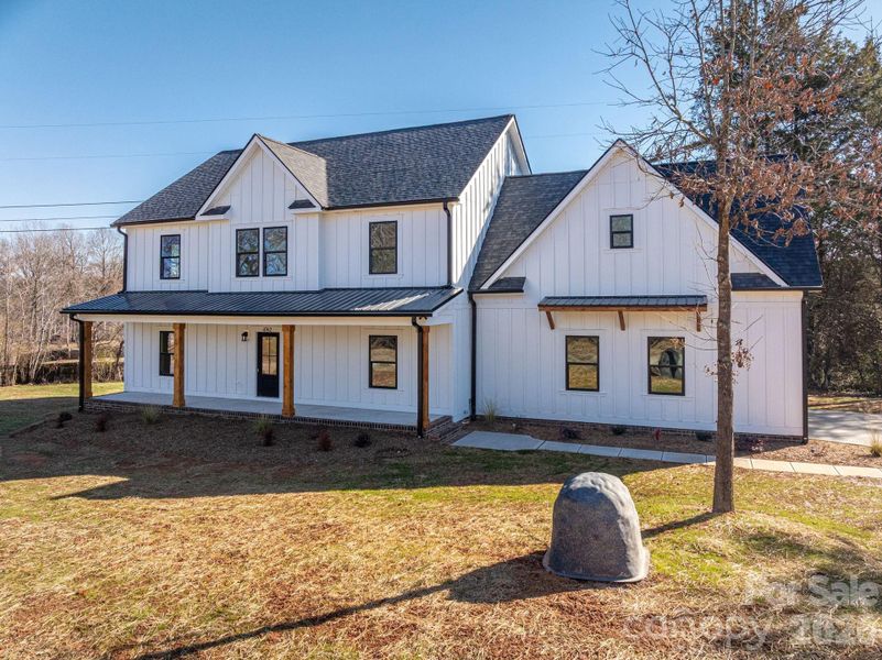 Front exterior of a new home in , Denver, NC, highlighting curb appeal (Image 25).