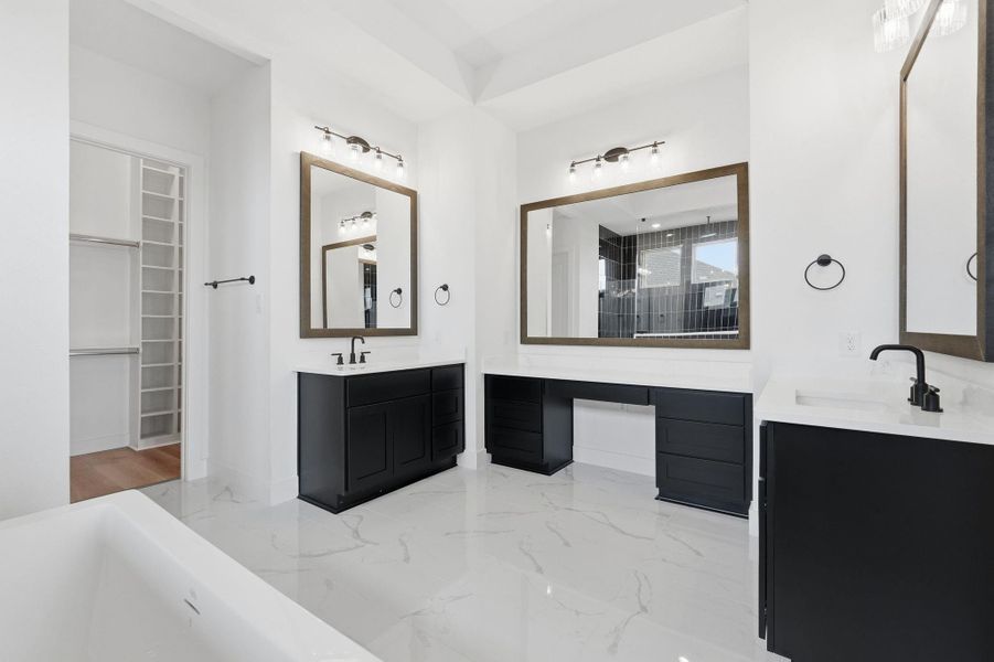Primary en-suite with separate walk-in shower and tub