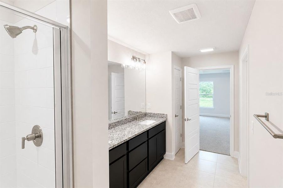 Furnished interior view inside a new home in Harmony Central, St. Cloud (Image 6).