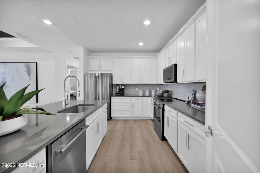 Furnished interior view inside a new home in Seminole Palms, Palm Coast (Image 10).