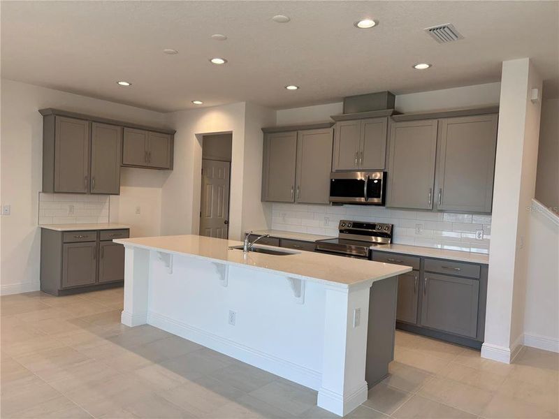 Furnished interior view inside a new home in Trinity Lakes, Groveland (Image 7).