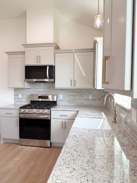 Furnished interior view inside a new home in TerraVista, Victoria (Image 10).