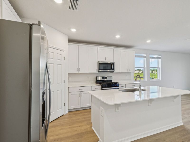 Furnished interior view inside a new home in The Reserve at Twin Lakes, St. Cloud (Image 4).