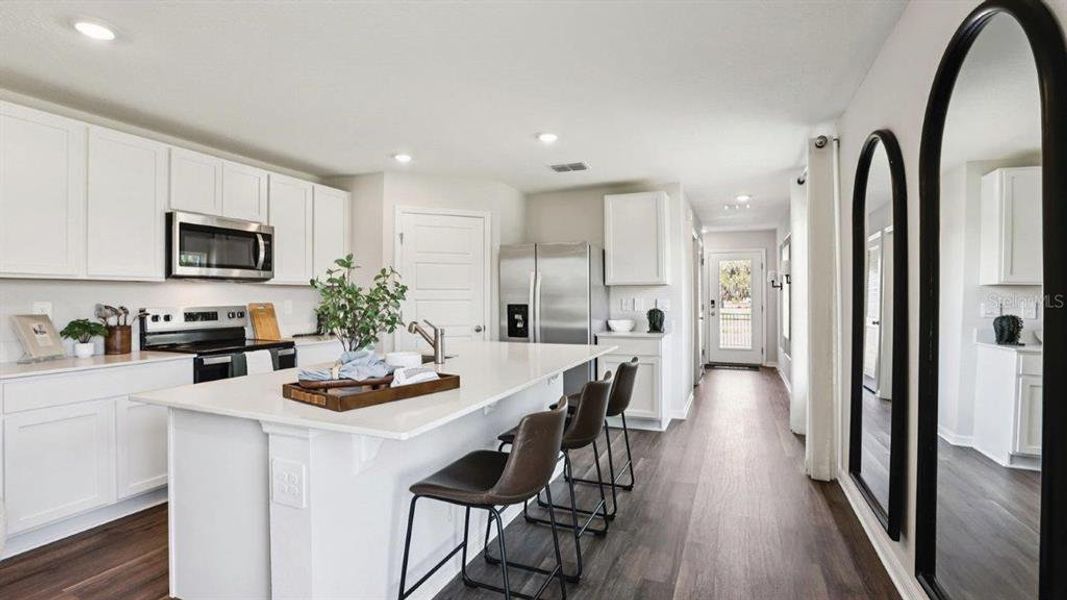 Furnished interior view inside a new home in Lake Deer Estates, Poinciana (Image 11).