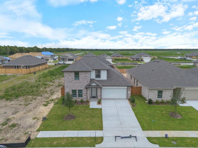 Front exterior of a new home in River Ranch Trails, Dayton, TX, highlighting curb appeal (Image 9). Front exterior of a new home in River Ranch Trails, Dayton, TX, highlighting curb appeal (Image 9).