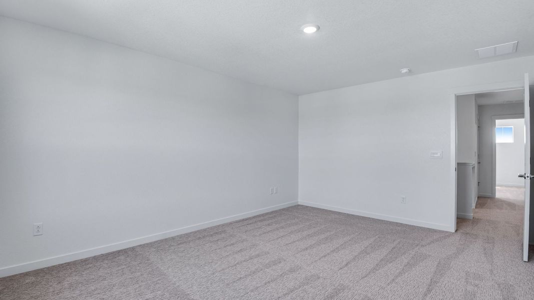 Spacious, unfurnished interior of a new home in Trails at Crowfoot, Parker (Image 35).