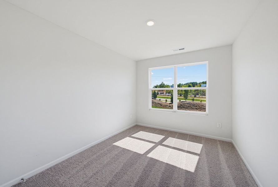 Spacious, unfurnished interior of a new home in Sweetbrier, Durham (Image 25).