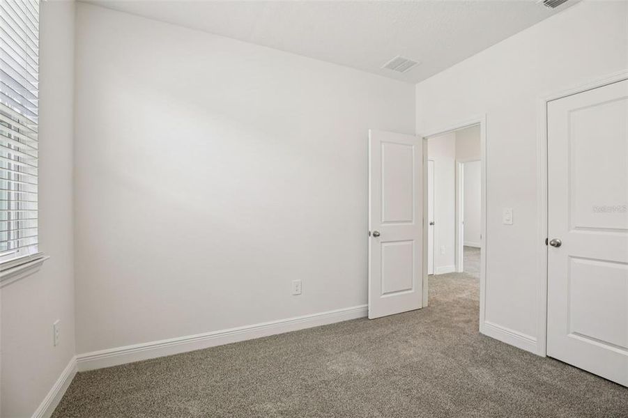 Spacious, unfurnished interior of a new home in Cyrene at Minneola - Villas, Minneola (Image 36).