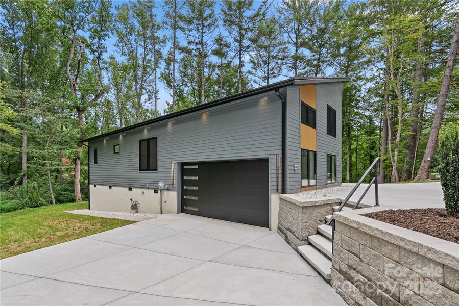Front exterior of a new home in , Arden, NC, highlighting curb appeal (Image 23).