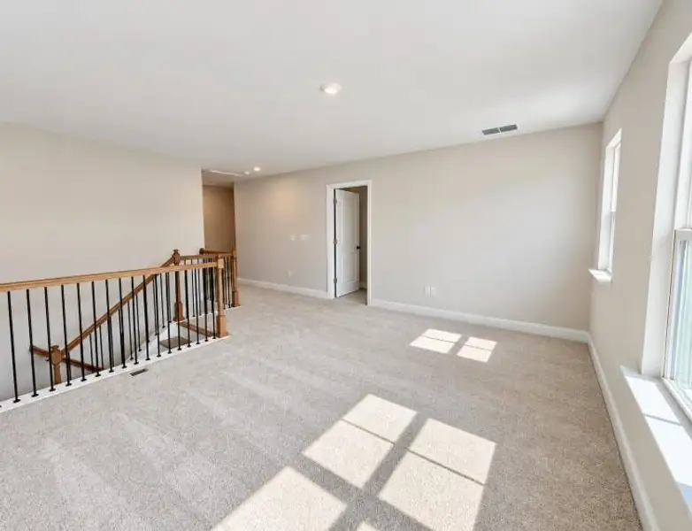Spacious, unfurnished interior of a new home in Berkeley Mill, Cumming (Image 20).