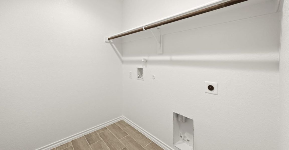 Representative exterior photo of a completed home built from the Pembridge II by Impression Homes in Mountain Valley, Burleson, TX (Image 22). Representative exterior photo of a completed home built from the Pembridge II by Impression Homes in Mountain Valley, Burleson, TX (Image 22).