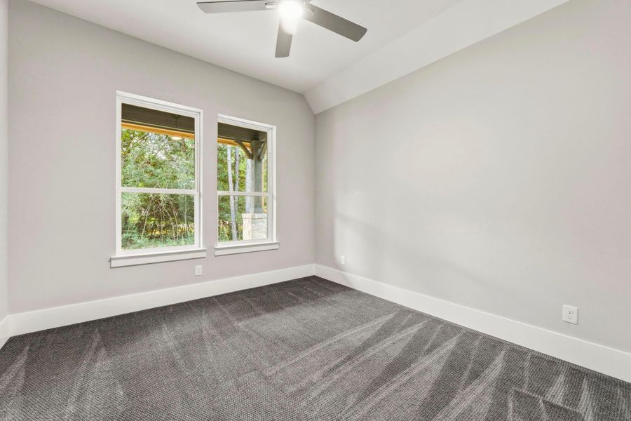 High ceilings, fans, and soft carpeting in all secondary bedrooms.