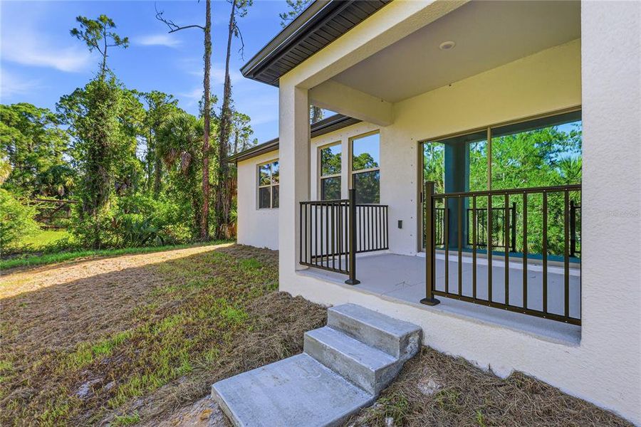 Exterior details and patio area of a home in , North Port (Image 17).