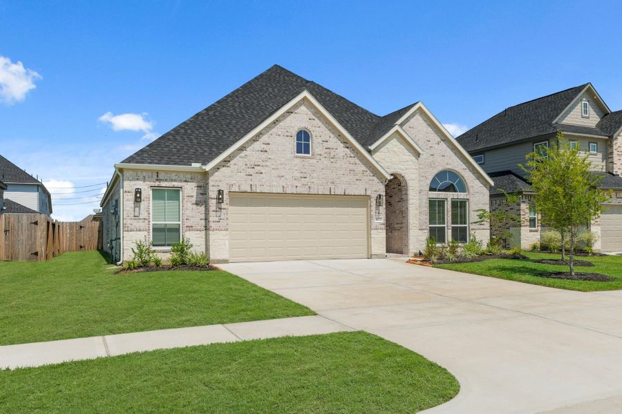 Front exterior of a new home in Briarwood Crossing, Rosenberg, TX, highlighting curb appeal (Image 19).
