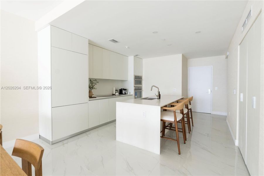 Furnished interior view inside a new home in Aria Reserve, Miami (Image 14).