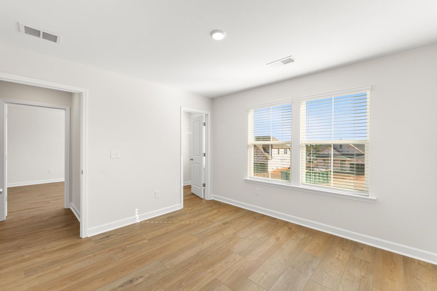 Spacious, unfurnished interior of a new home in Cottages at Lake Emory, Inman (Image 37).