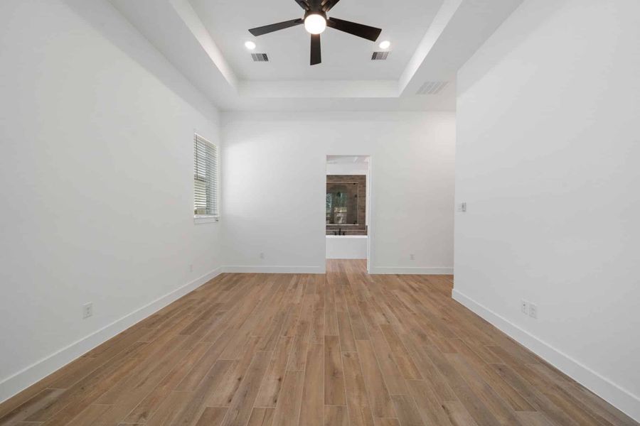 Representative unfurnished interior of a home built from the Waterloo 60′ Lot by Chesmar Homes in Fulshear Lakes, Fulshear (Image 25).