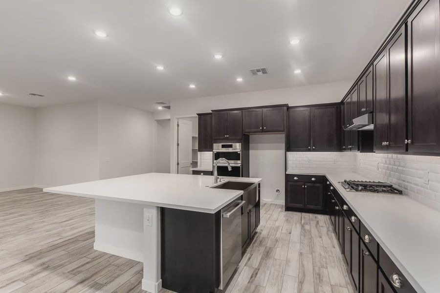 Furnished interior view inside a new home in Valencia at Granite Vista, Waddell (Image 7).