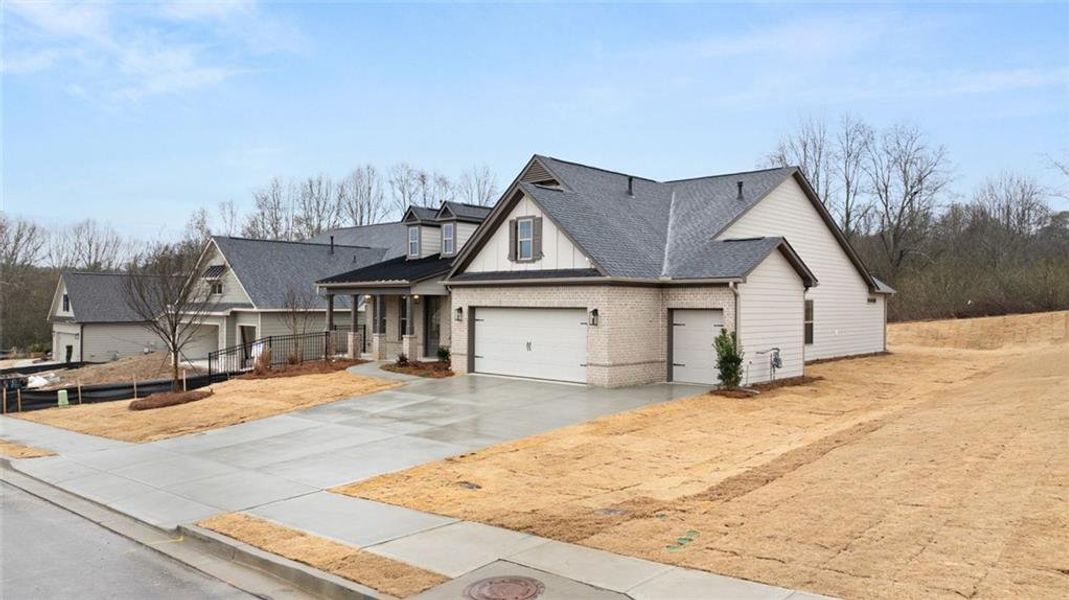 Front exterior of a new home in Soleil Belmont Park, Canton, GA, highlighting curb appeal (Image 27).