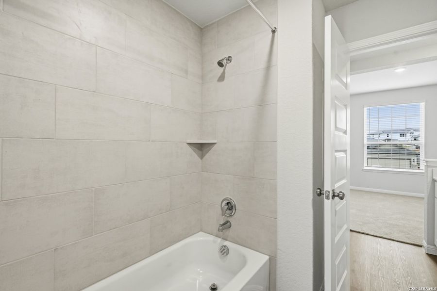 Furnished interior view inside a new home in Cinco Lakes, San Antonio (Image 7).