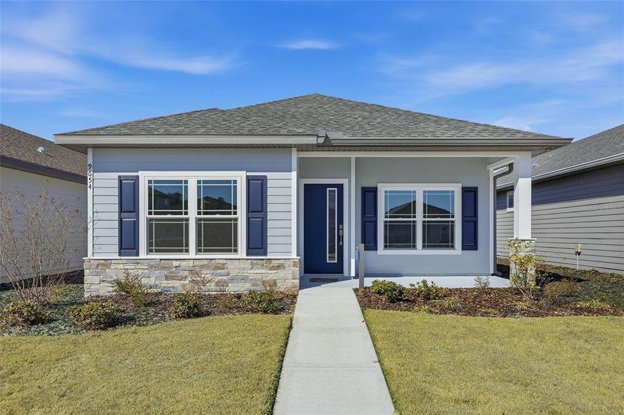 Front exterior of a new home in , Gainesville, FL, highlighting curb appeal (Image 24).