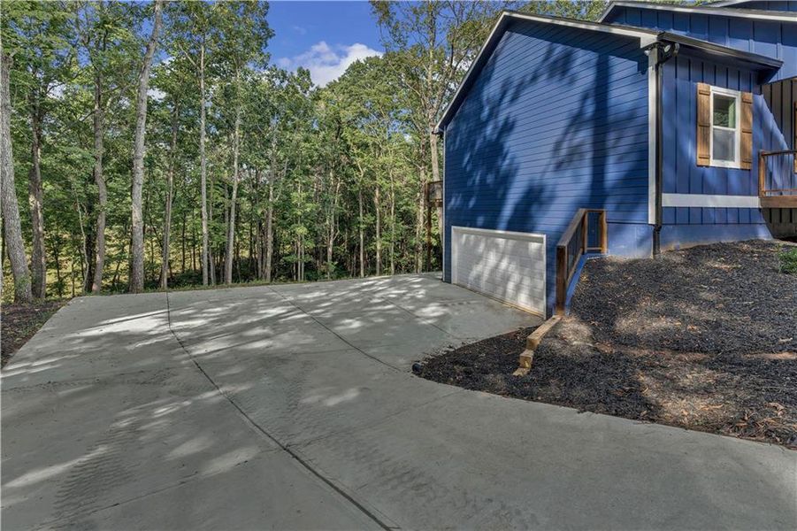 Front exterior of a new home in , Ellijay, GA, highlighting curb appeal (Image 23).