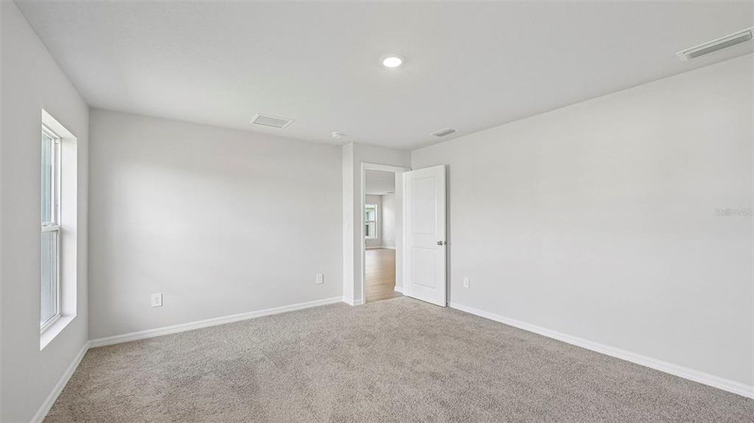 Spacious, unfurnished interior of a new home in Rye Crossing, Parrish (Image 23).