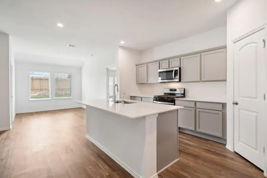 Furnished interior view inside a new home in Grand Pines, Magnolia (Image 4).