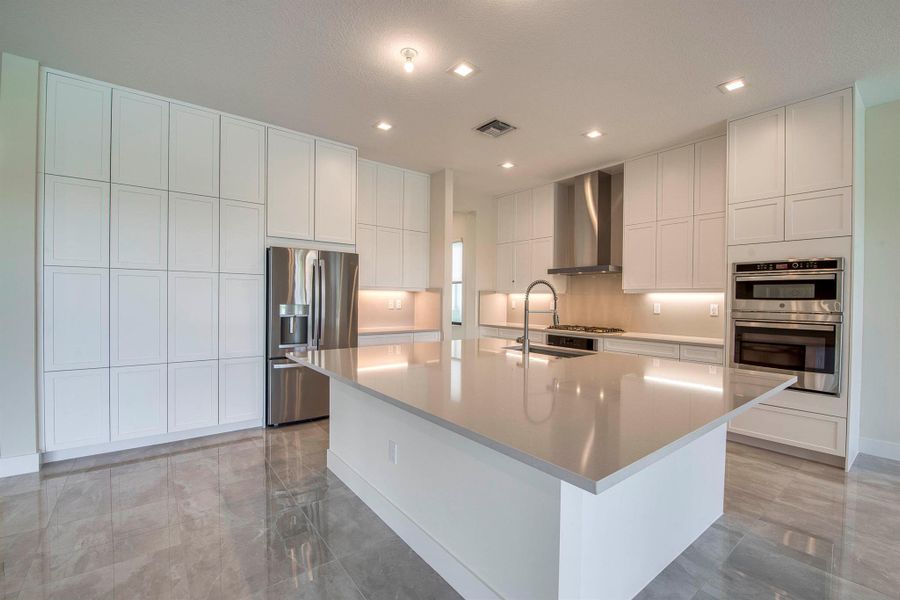 Furnished interior view inside a new home in Apex at Avenir, Palm Beach Gardens (Image 39).