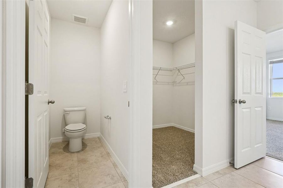 Spacious, unfurnished interior of a new home in Springs at Lake Alfred - Classic Series, Lake Alfred (Image 14).