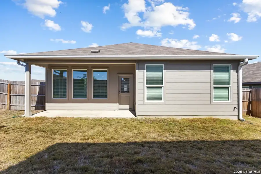 Exterior details and patio area of a home in Hightop Ridge, Converse (Image 30).
