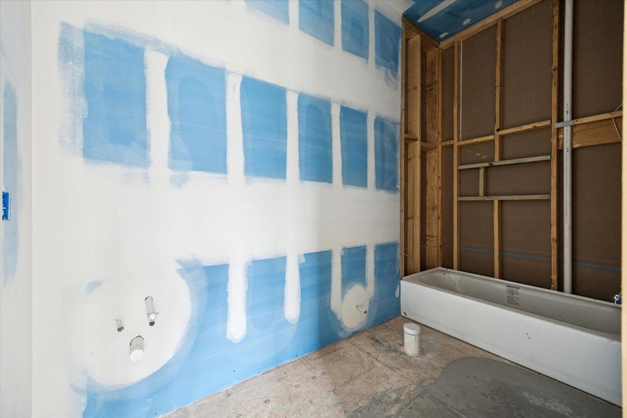 Connected directly to the bedroom, this ensuite bathroom includes a shower tub combination and a well planned layout that balances functionality with comfort. The space is designed to accommodate quality finishes while maintaining an easy, low maintenance flow.