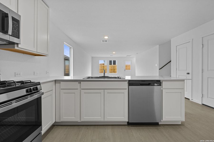 Furnished interior view inside a new home in Voss Farms, New Braunfels (Image 3).