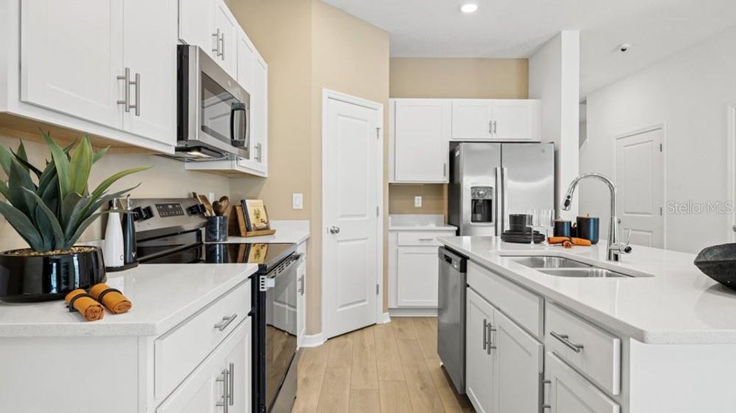 Furnished interior view inside a new home in The Towns at Tiburon, Nokomis (Image 10).