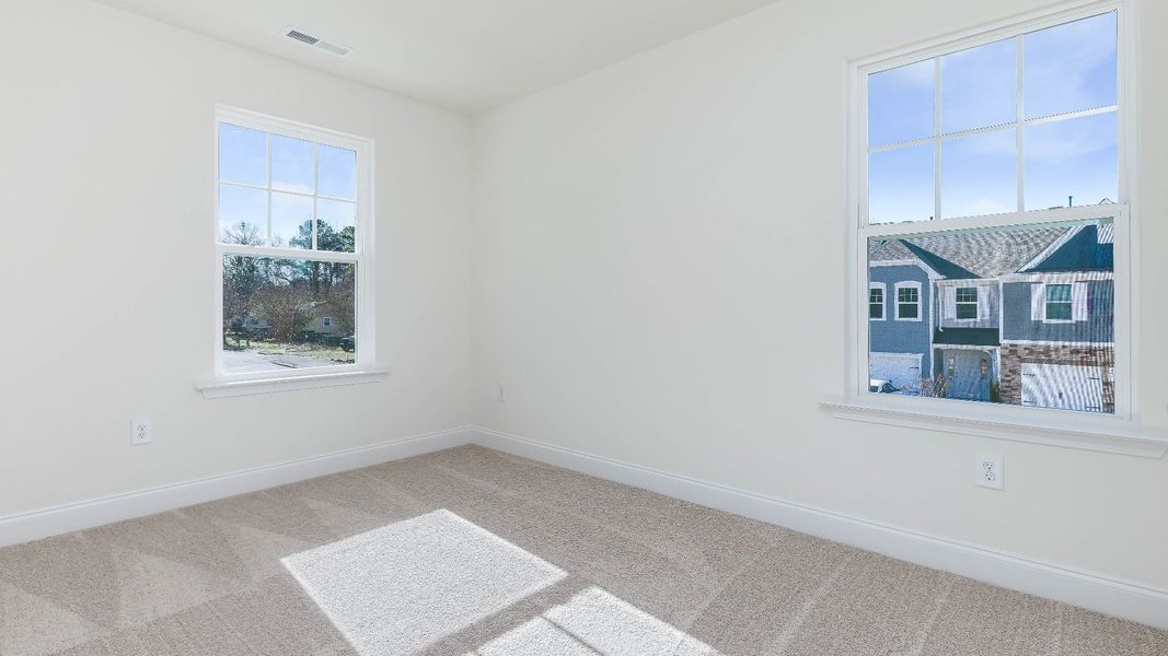 Furnished interior view inside a new home in Battle Bridge, Raleigh (Image 35).