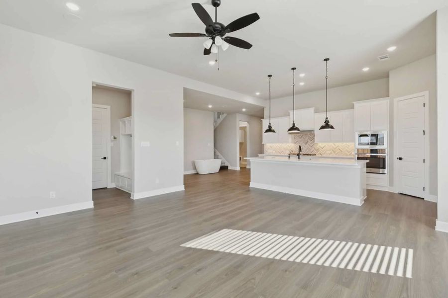 Representative unfurnished interior of a home built from the Windcrest by Chesmar Homes in Talia, Mesquite (Image 14).