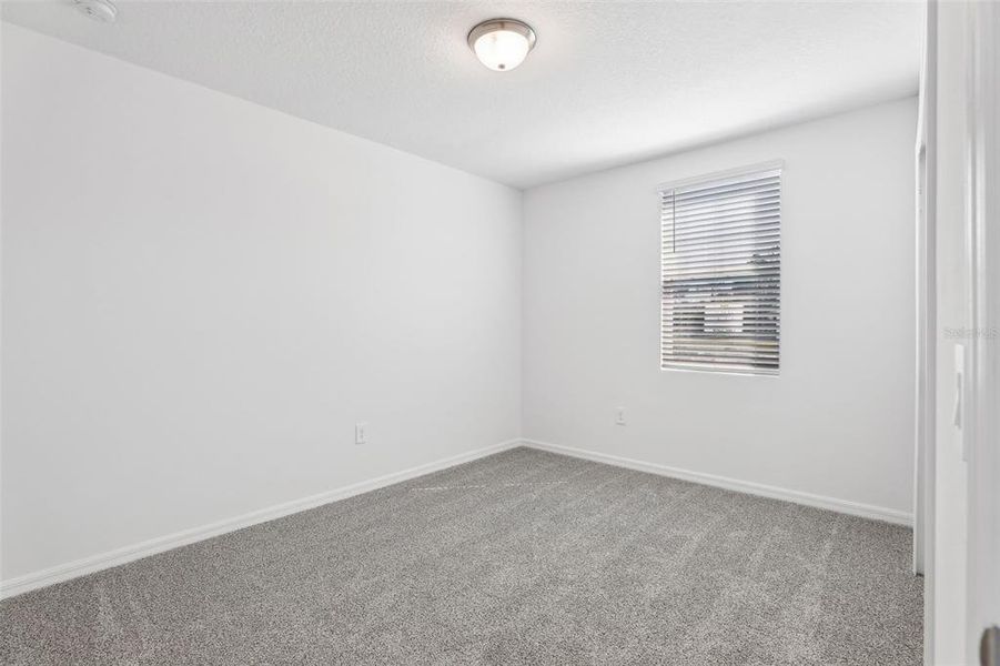 Spacious, unfurnished interior of a new home in Lake Deer Estates - Signature Series, Poinciana (Image 41). Spacious, unfurnished interior of a new home in Lake Deer Estates - Signature Series, Poinciana (Image 41).