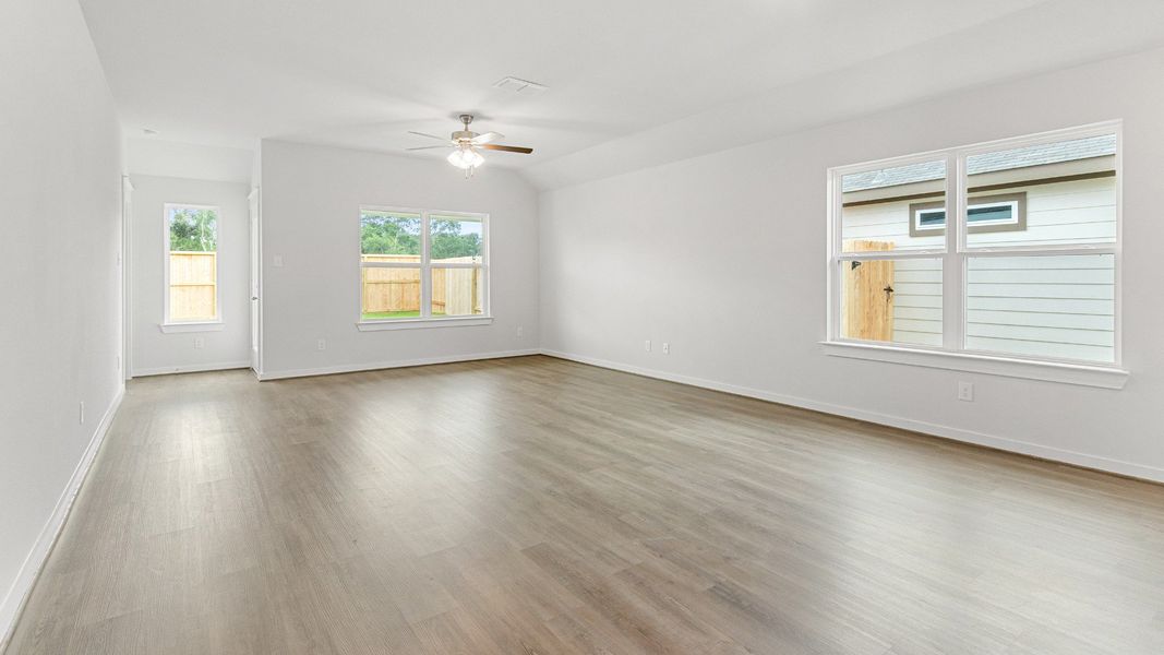 Representative furnished interior of a home built from the Kimbell by Brightland Homes in Sunterra, Katy (Image 9).