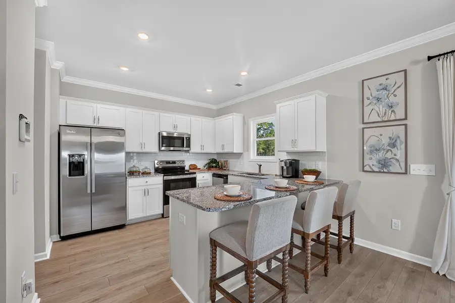 Representative furnished interior of a home built from the Guilford - Genesis Value Collection by Mungo Homes in Bissetts Landing, Spring Hope (Image 4).